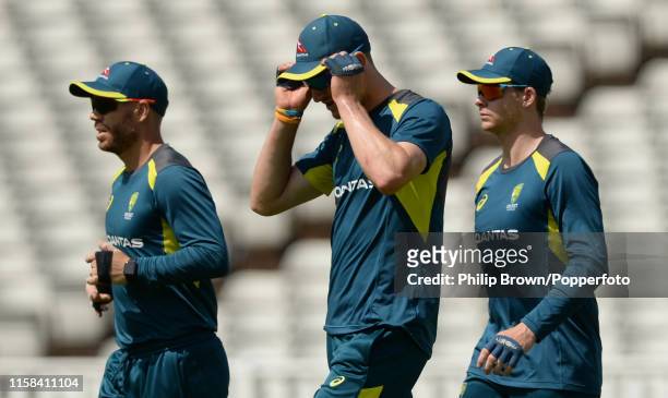 David Warner, Cameron Bancroft and Steve Smith of Australia during a training session before the first Specsavers Test Match between England and...