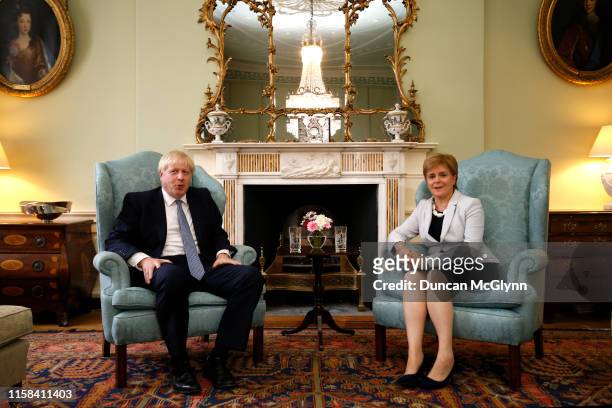 British Prime Minister Boris Johnson poses for a photograph with Scottish First Minister Nicola Sturgeon at Bute House on July 29, 2019 in Edinburgh,...