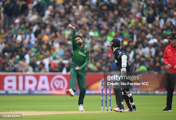 Mohammad Amir of Pakistan bowls during the Group Stage match of the ICC Cricket World Cup 2019 between New Zealand and Pakistan at Edgbaston on June...