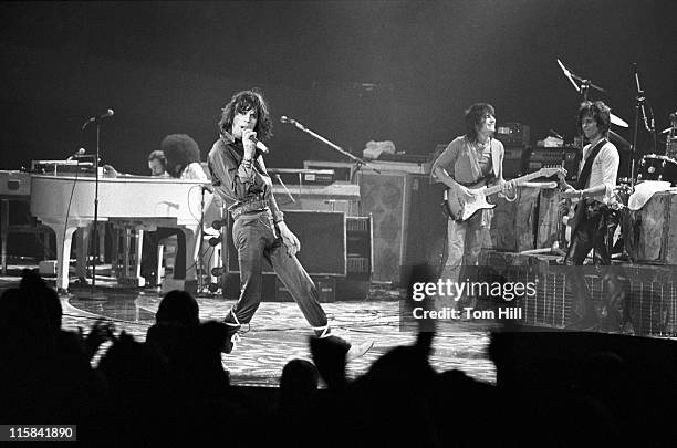 Keyboardist Billy Preston, singer-frontman Mick Jagger, guitarist Ron Wood and guitarist Keith Richards perform with The Rolling Stones at the Omni...