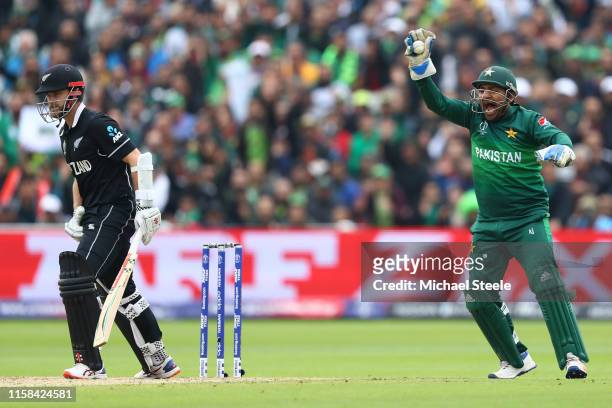 Pakistan wicketkeeper Sarfaraz Ahmed appeals succesfully after taking a catch to dismiss Kane Williamson of New Zealand off the bowling of Shadab...
