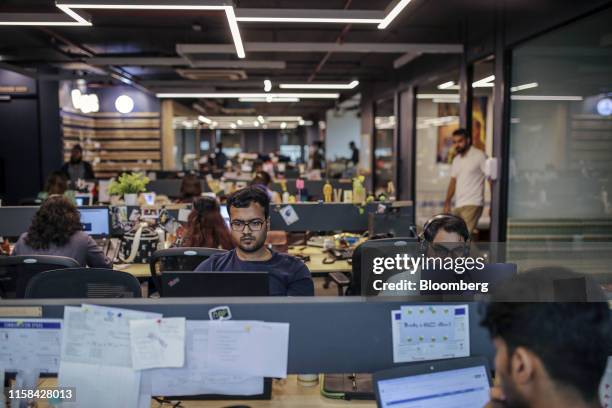 Employees work at the Pocket Aces Pvt studio in Mumbai, India, on Monday, July 29, 2019. The tiny digital studio is making a name for itself in the...