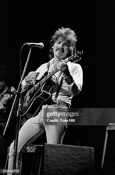 Singer-songwriter John Prine performs at Symphony Hall on April 23, 1975 in Atlanta, Georgia.
