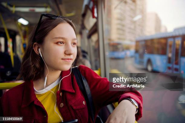 teen girl travelling by bus - girl waiting stock pictures, royalty-free photos & images