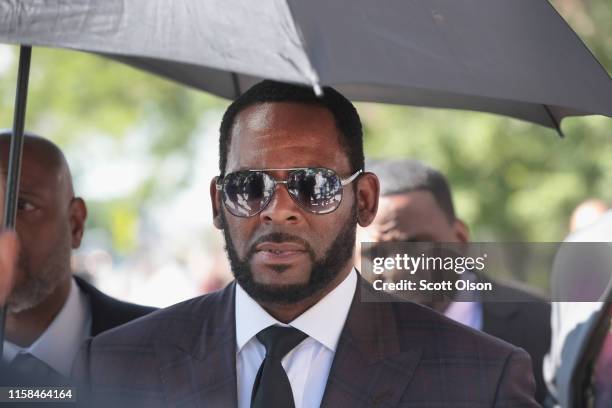 Singer R. Kelly leaves the Leighton Criminal Courts Building following a hearing on June 26, 2019 in Chicago, Illinois. Prosecutors turned over to...