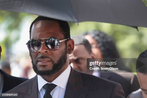 Singer R. Kelly leaves the Leighton Criminal Courts Building following a hearing on June 26, 2019 in Chicago, Illinois. Prosecutors turned over to...