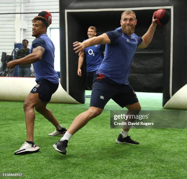 Brad Shields and Anthony Watson throw balls as they take part in a game of dodgeball at Pennyhill Park on June 26, 2019 in Bagshot, England.