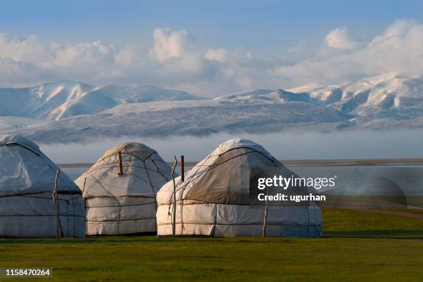 nomadic tents known as yurt at the song kol lake, kyrgyzstan - yurt stock pictures, royalty-free photos & images