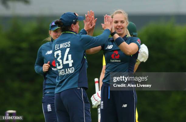 Freya Davies of England Women's Academy celebrates after taking the wicket of Meg Lanning of Australia Women during the match between England Women's...