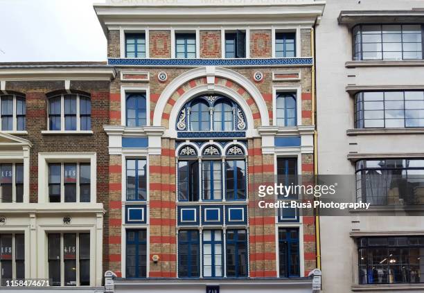 elaborate facade of townhouse near covent garden market in the west end of london, england - west front stock pictures, royalty-free photos & images