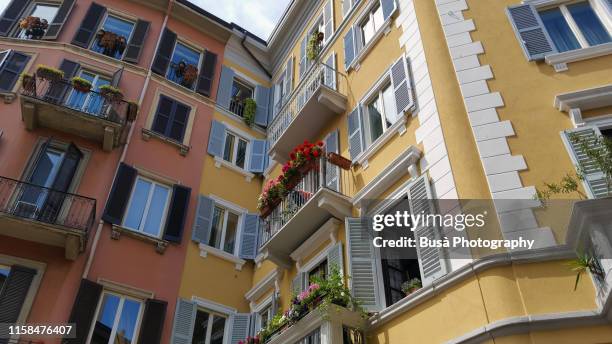view from below of traditional residential buildings in the brera district in milan, italy - milan street fashion 2019 foto e immagini stock