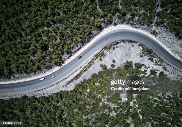 aerial view of winding road in the forest. mugla, turkey - caria stock pictures, royalty-free photos & images