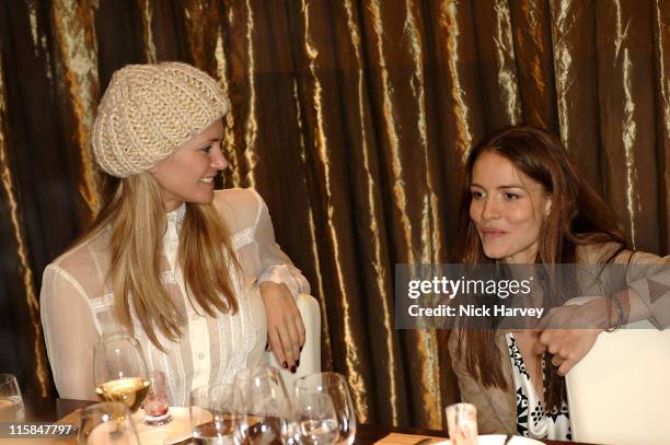 Natasha Henstridge and Saffron Burrows during Loewe Lunch at The Hospital at The Hospital in London, Great Britain.