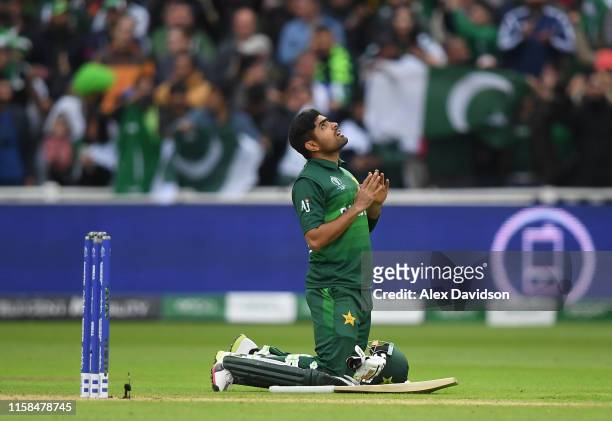 Babar Azam of Pakistan celebrates after scoring a century during the Group Stage match of the ICC Cricket World Cup 2019 between New Zealand and...