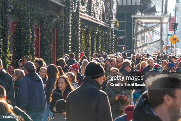 Crowds Of Pedestrians On Fifth Avenue Photos and Premium High Res ...