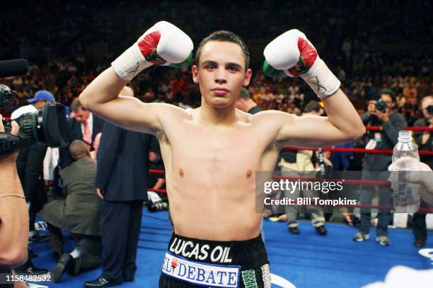 June 9: Julio Cesar Chavez Jr raises his arms in victory after defeating his opponent Grover Wiley in their Super Featherweight bout at Madison...