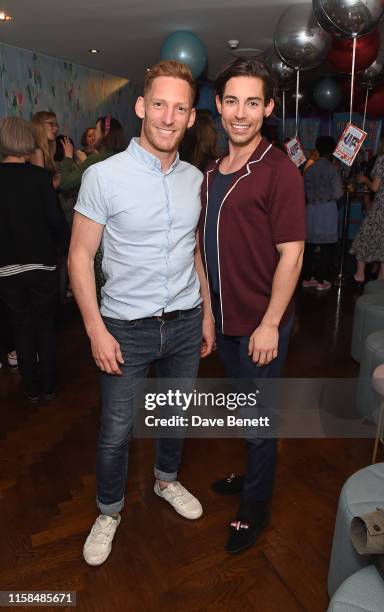 Guest and Tom Read Wilson attend a party to celebrate the upcoming release of Vick Hope and Roman Kemp's new children's book 'Listen Up', at The h...