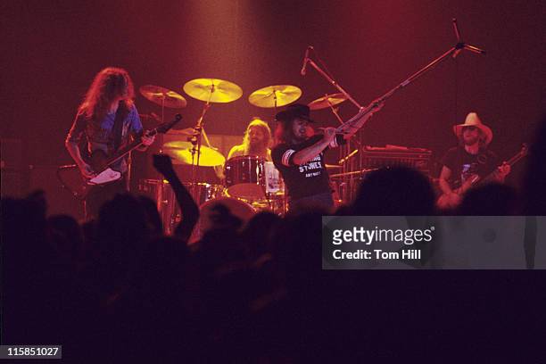 Guitarist Allen Collins, drummer Artimus Pyle, singer Ronnie Van Zant and bassist Leon Wilkeson of Lynyrd Skynyrd perform at the Omni Coliseum on...