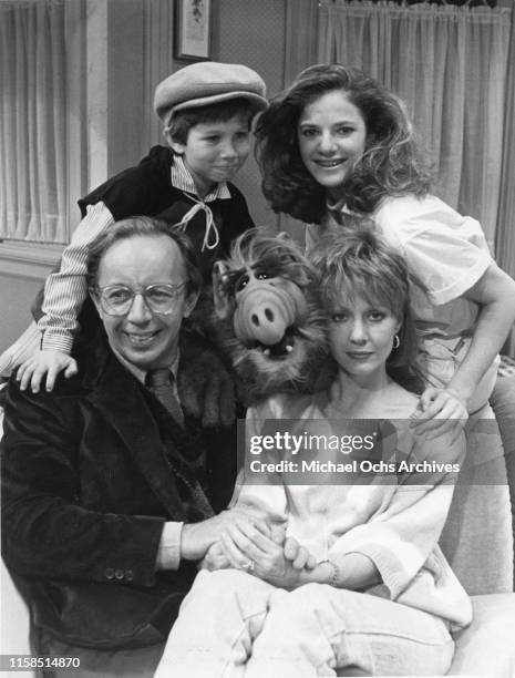 Max Wright, Benji Gregory, Andrea Elson, and Anne Shedeen with ALF aka Alien Life Form in still from the TV show "ALF" on May 23, 1986 in Los...