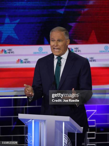 Washington Gov. Jay Inslee speaks during the first night of the Democratic presidential debate on June 26, 2019 in Miami, Florida. A field of 20...