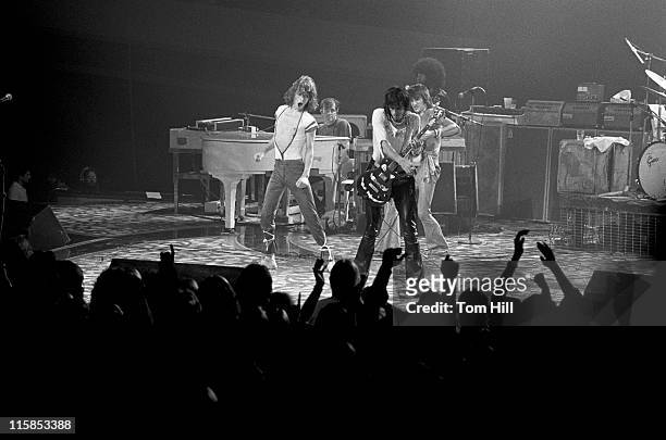 Singer-frontman Mick Jagger, Ian Stewart , guitarists Keith Richards and Ron Wood, and Billy Preston perform with The Rolling Stones at the Omni...