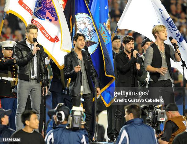 Musicians Alexander Noyes, Jason Rosen, Michael Bruno and Andrew Lee of Honor Society perform the national anthem at the 2010 Pro Bowl at Sun Life...