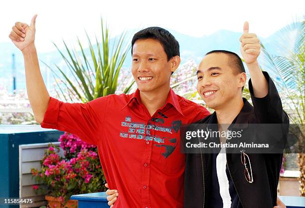 Sakada Kaewbuadee and Apichatpong Weerasethakul during 2004 Cannes Film Festival - "Tropical Malady" - Photocall at Palais Du Festival in Cannes,...