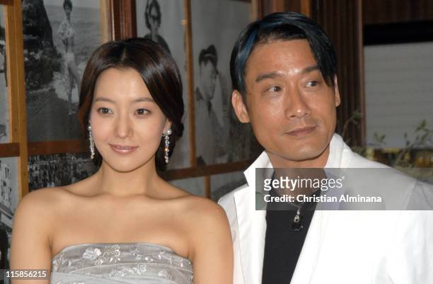 Kim Hee-Seon and Tony Leung Ka-fai Ka Fai during 2005 Cannes Film Festival - "The Myth" Party at Majestic Beach in Cannes, France.