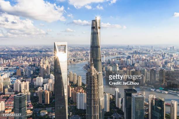 aerial view of shanghai skyscrapers - shanghai stock pictures, royalty-free photos & images