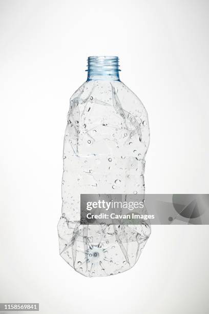 used water bottle and white background - bottle stock-fotos und bilder