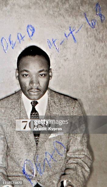 In this handout, American Baptist minister and activist Martin Luther King Jr in a mug shot following his arrest during the Montgomery bus boycotts,...