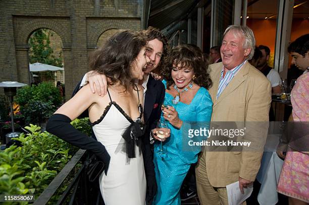 Angela Newley, Sacha Newley, Joan Collins and guest attend the Sacha Newley 'Blessed Curse' exhibition private view at The Arts Club on July 2, 2008...