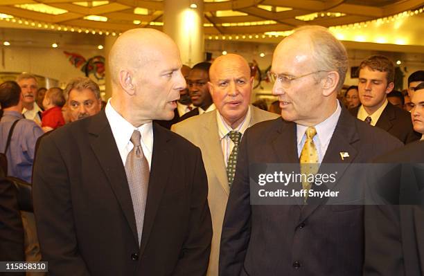 Bruce Willis with Sen. Larry Craig during Bruce Willis and the Congressional Coalition on Adoption Institute host "Rugrats Go Wild" Screening for...