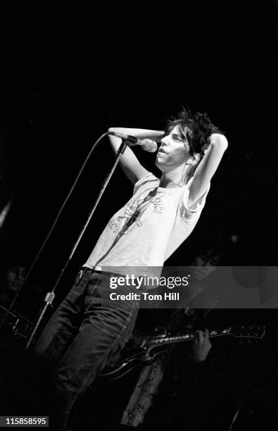 Singer-songwriter-poet Patti Smith performs at Alex Cooley's Electric Ballroom on January 23, 1976 in Atlanta, Georgia.