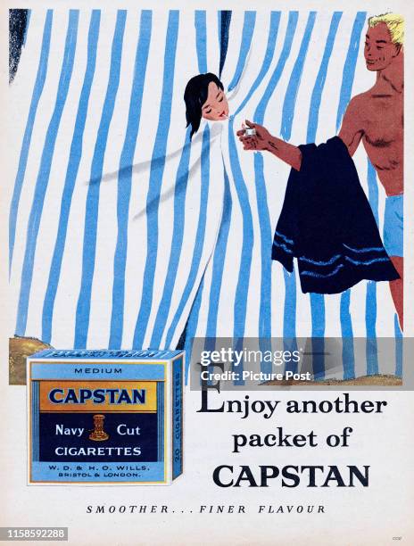 Advertisement for Capstan Navy Cut cigarettes showing a man lighting the cigarette of a woman inside a beach hut. Original Publication: Picture Post...