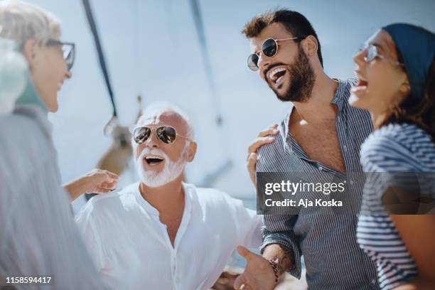 family enjoying summer vacation. - young couple sailing stock pictures, royalty-free photos & images