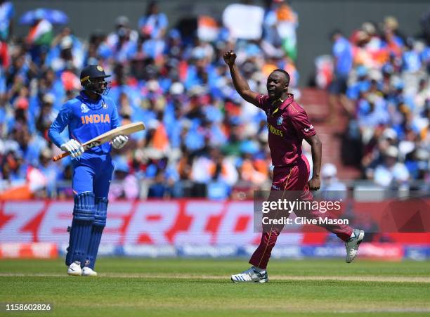 Kemar Roach of West Indies celebrates dismissing Vijay Shankar of India during the Group Stage match of the ICC Cricket World Cup 2019 between West...