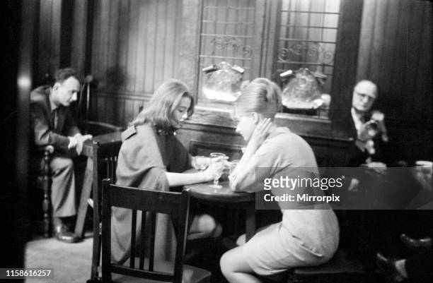 Christine Keeler and Mandy Rice-Davies taking a break from the trial of society osteopath Stephen Ward at the Old Bailey on Monday 22nd July 1963....