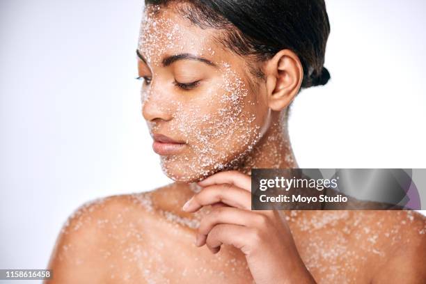 do your know the benefits of using salt for your skin? - clay mask face woman stock pictures, royalty-free photos & images