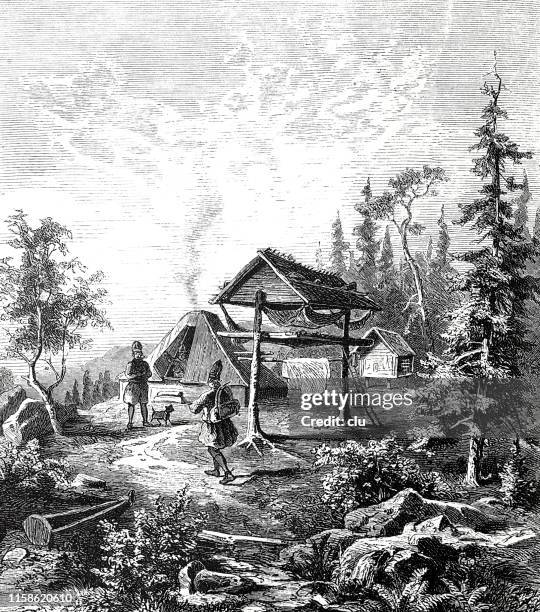 lapland huts in the forest - chalet stock illustrations
