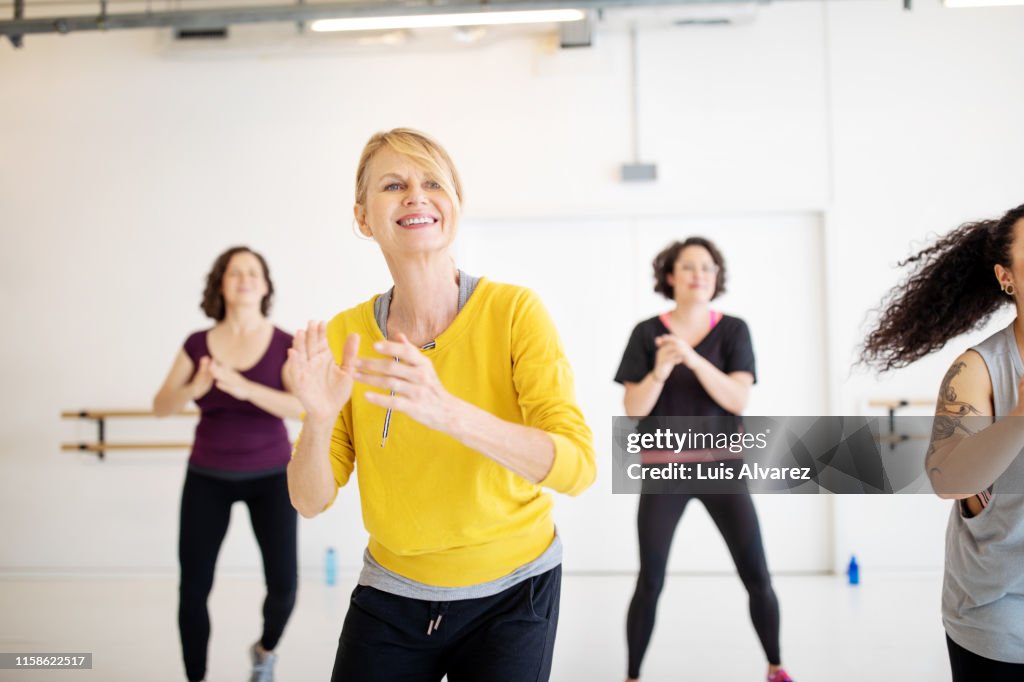 Students enjoying a fitness dance in class