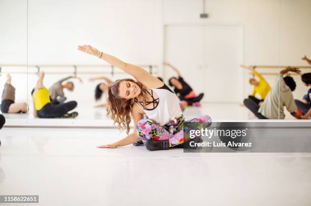 women stretching in dance class - dance studio stock pictures, royalty-free photos & images