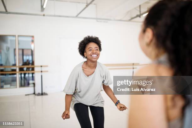 african woman dancing at fitness club - dance routine stock pictures, royalty-free photos & images