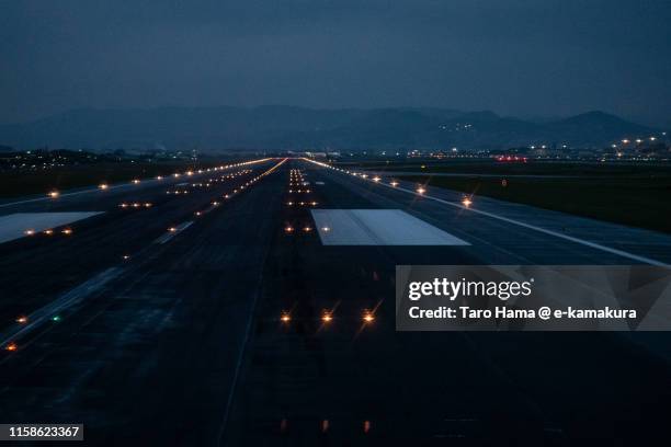 the airport runaway in hyogo japan - airplane lights stock pictures, royalty-free photos & images