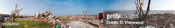 Destruction and debris from an EF5 tornado covers the ground in this 360 degree panoramic view on June 6, 2011 in Joplin, Missouri. The powerful...