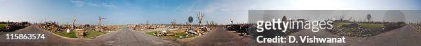Destruction and debris from an EF5 tornado covers the ground in this 360 degree panoramic view on June 6, 2011 in Joplin, Missouri. The powerful...