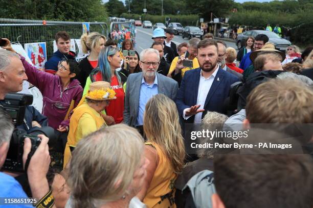 Jeremy Corbyn speaks to anti-fracking protestors outside the gate at the Preston New Road shale gas exploration site in Lancashire.