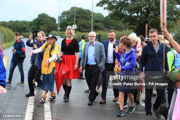 Jeremy Corbyn speaks to anti-fracking protestors outside the gate at the Preston New Road shale gas exploration site in Lancashire.