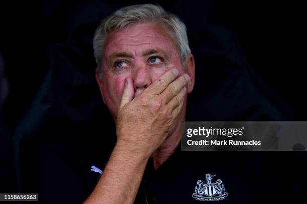 Steve Bruce, Manager of Newcastle United in the dugout ahead of the Pre-Season Friendly match between Hibernian FC and Newcastle United FC at Easter...