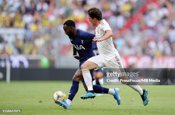 Georges-Kévin Nkoudou of Tottenham Hotspur competes with Alvaro Odriozola of Real Madrid during the Audi Cup 2019 semi final match between Real...
